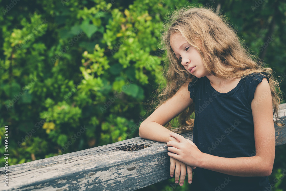 Portrait of sad blond teen girl