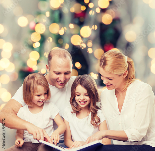 happy family with book at home