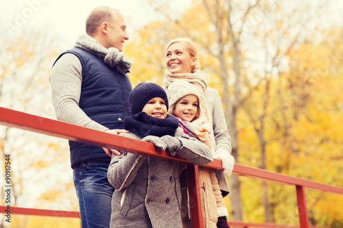 happy family in autumn park © Syda Productions