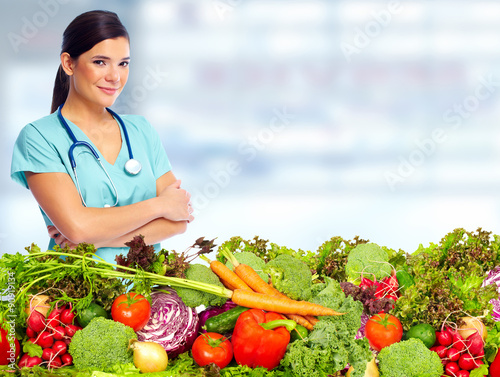 Doctor nutritionist with vegetables. photo