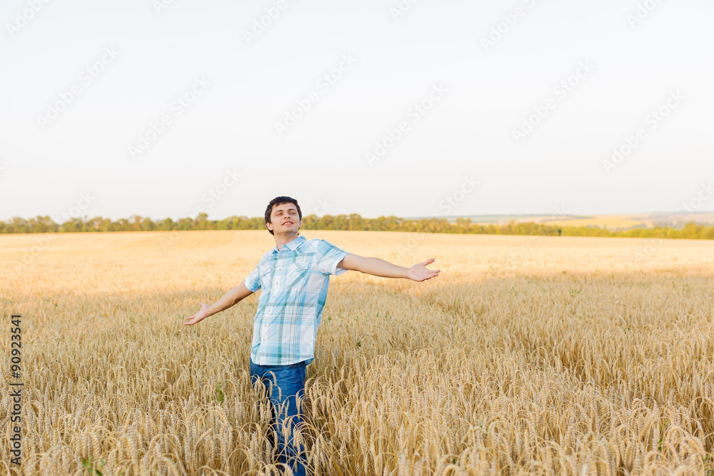 man on wheat field