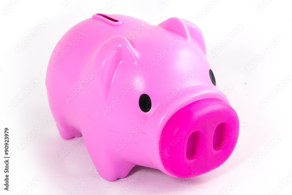 Coin into piggy pink pig on white background