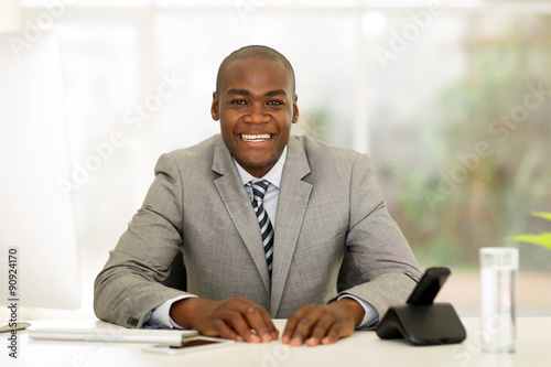 african businessman sitting in office