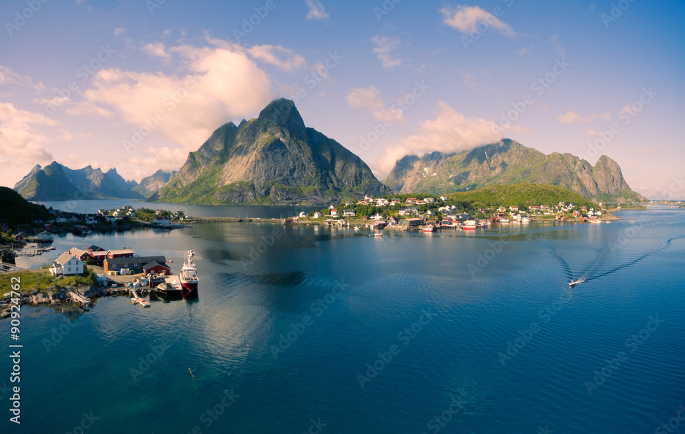Breathtaking aerial panorama of fishing town Reine and surrounding fjords on Lofoten islands in Norway, famous tourist destination
