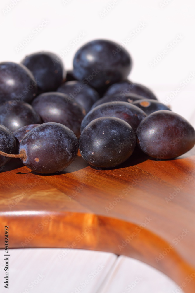 Damsons on wooden chopping board.
Damsons piled on a wooden chopping board. Damsons on wooden chopping board.
Damsons piled on a wooden chopping board.