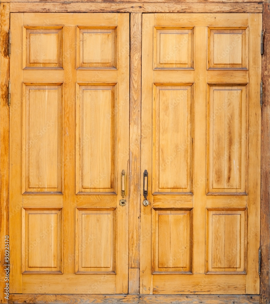 Wooden door, classical architecture background Wooden door, classical architecture background