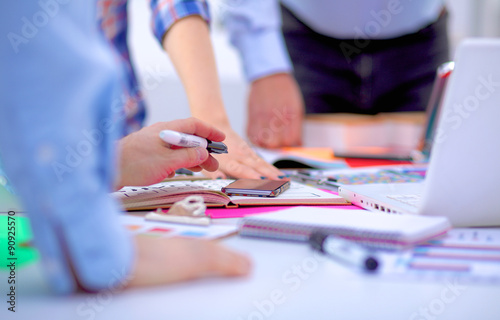 Young business people working at office on new project