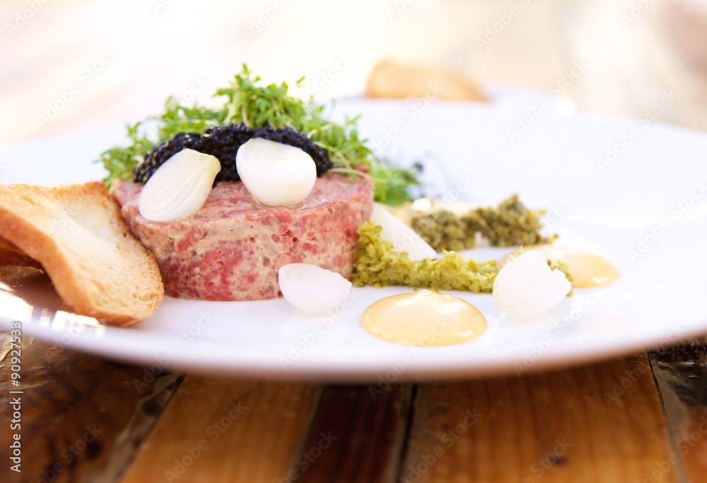 Caviar and steak tartare with toast