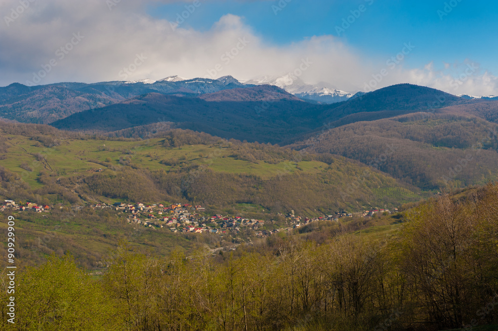 small village landscape in the mountains in spring panorama