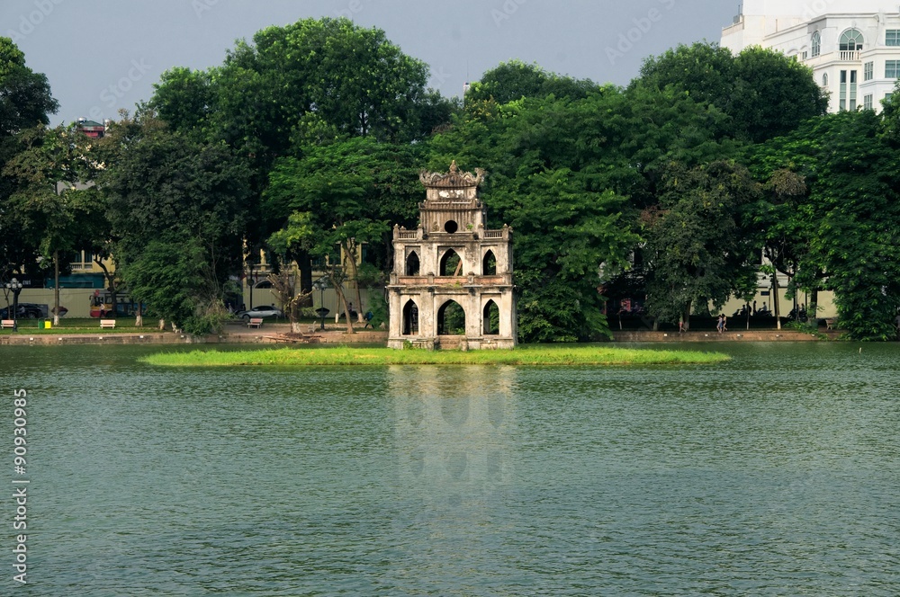 Ho Hoan Kiem, the little lake in the old part of Hanoi, Vietnam, with the Tortoise Tower. Tortoise Tower is the symbol of Hanoi,Vietnam