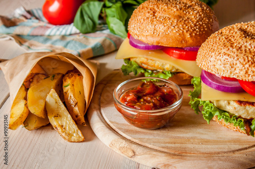 burger with fried potatos 