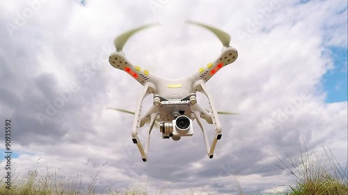 Drone quadrocopter with high resolution digital camera. New tool for aerial photo and video. 