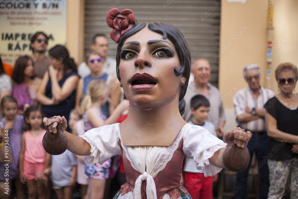 Cabezuda tocando castañuelas en la procesión del Corpus StockFoto