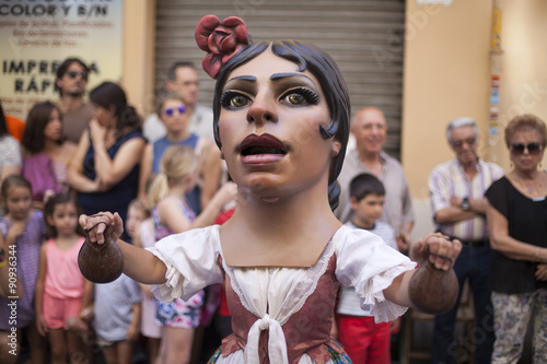 Cabezuda tocando castañuelas en la procesión del Corpus photo
