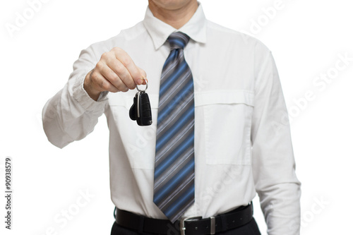 Businessman giving a car key