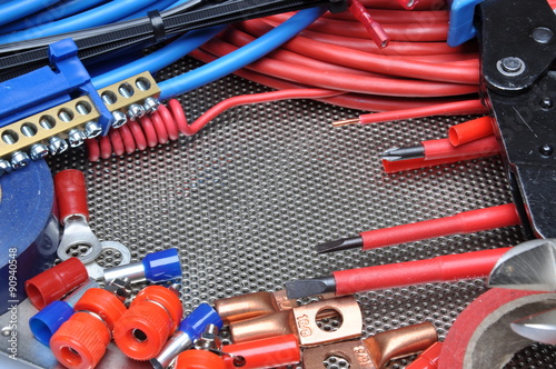 Electrical tools, component and cables on metal surface