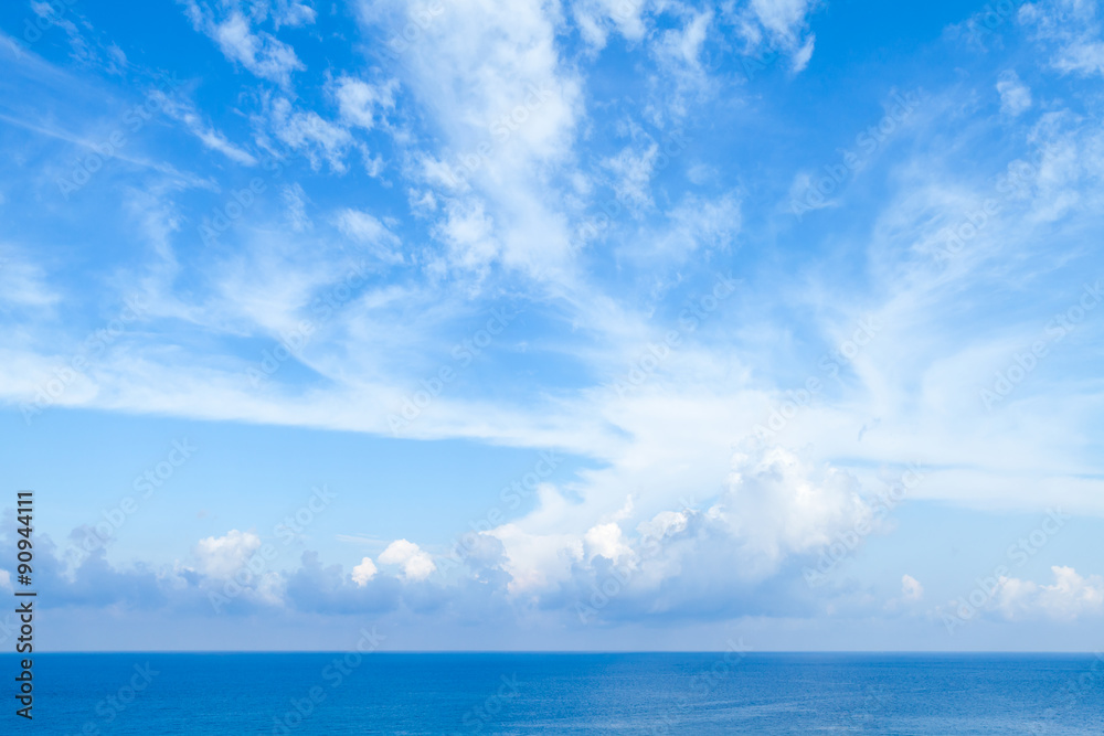 Sea landscape with bright blue cloudy sky