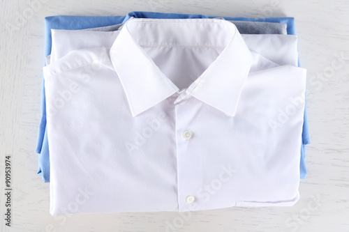 Business shirts on white table