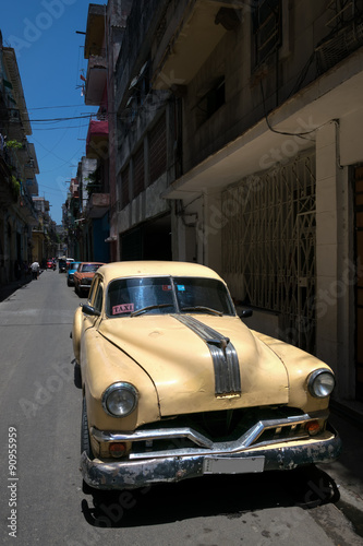 Yellow taxi in Old Havana