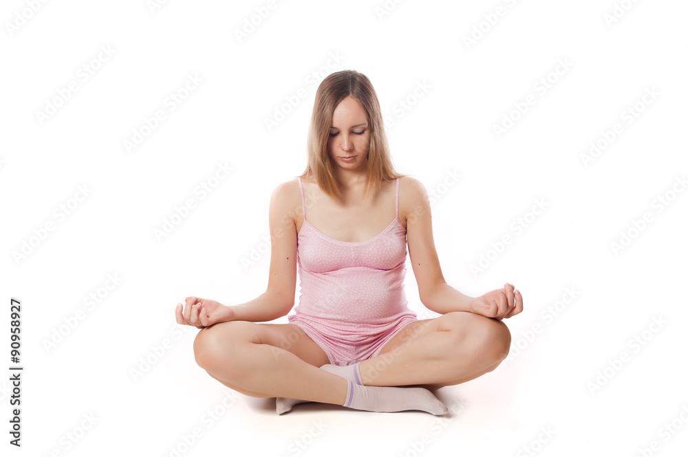 Cute pregnant woman in a good shape isolated on white background Cute pregnant woman in a good shape isolated on white background