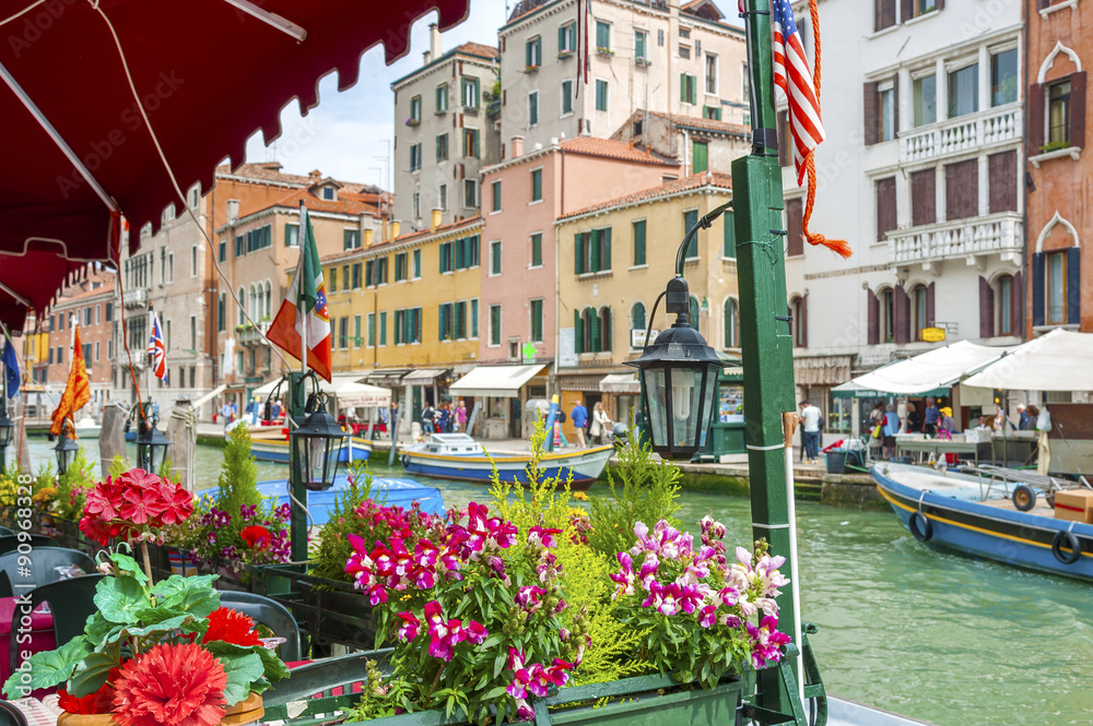 Naklejka premium Sidewalk Cafe in Grand Canal of Venice, Italy