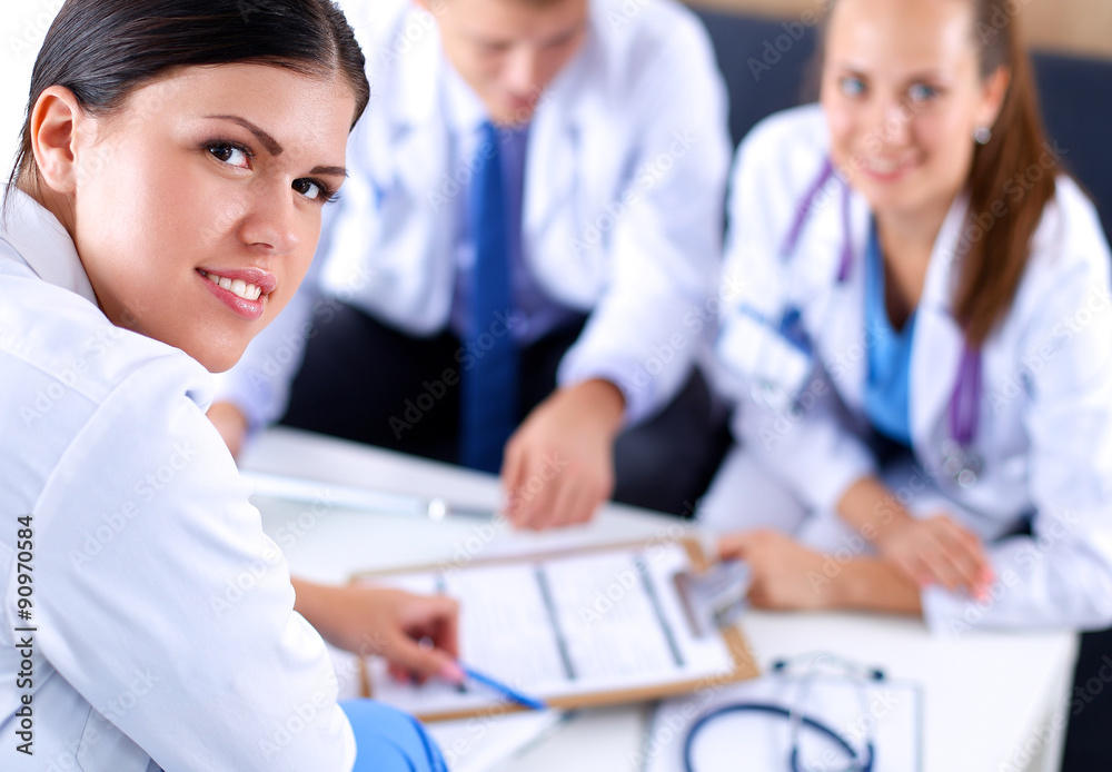 Fototapeta premium Happy medical team discussing and working together