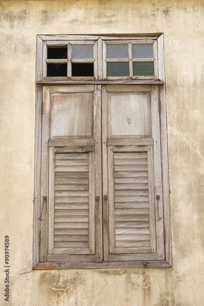 Old wooden window at old town ; Songkhla province Thailand Old wooden window at old town ; Songkhla province Thailand