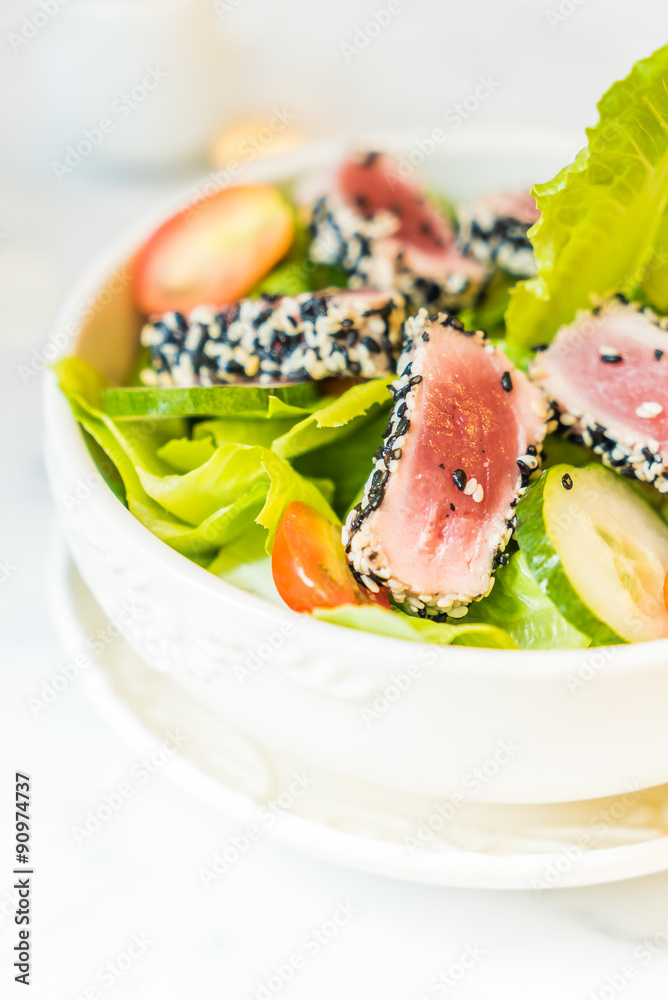 Grilled tuna salad in white bowl - healthy food Grilled tuna salad in white bowl - healthy food