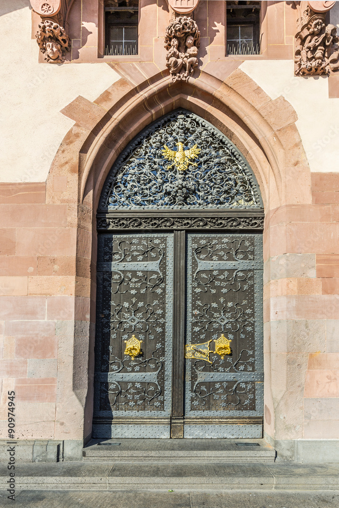 detail of old wooden door of townhall  in Frankfurt