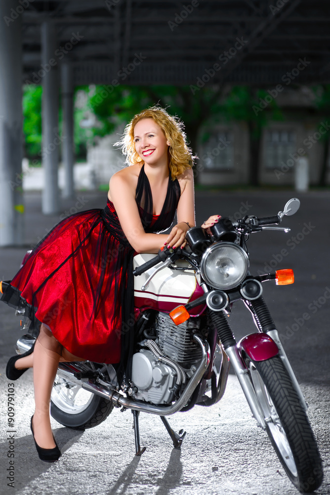 Girl in dress on motorcycle hot sale