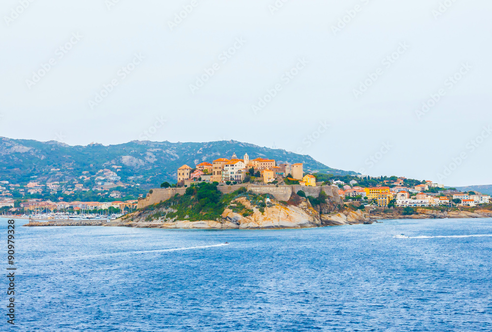Medieval village of Calvi on rocky hill, island Corsica, France