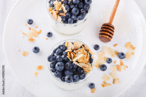 Homemade yoghurt with blueberry,almond and honey.selective focus
