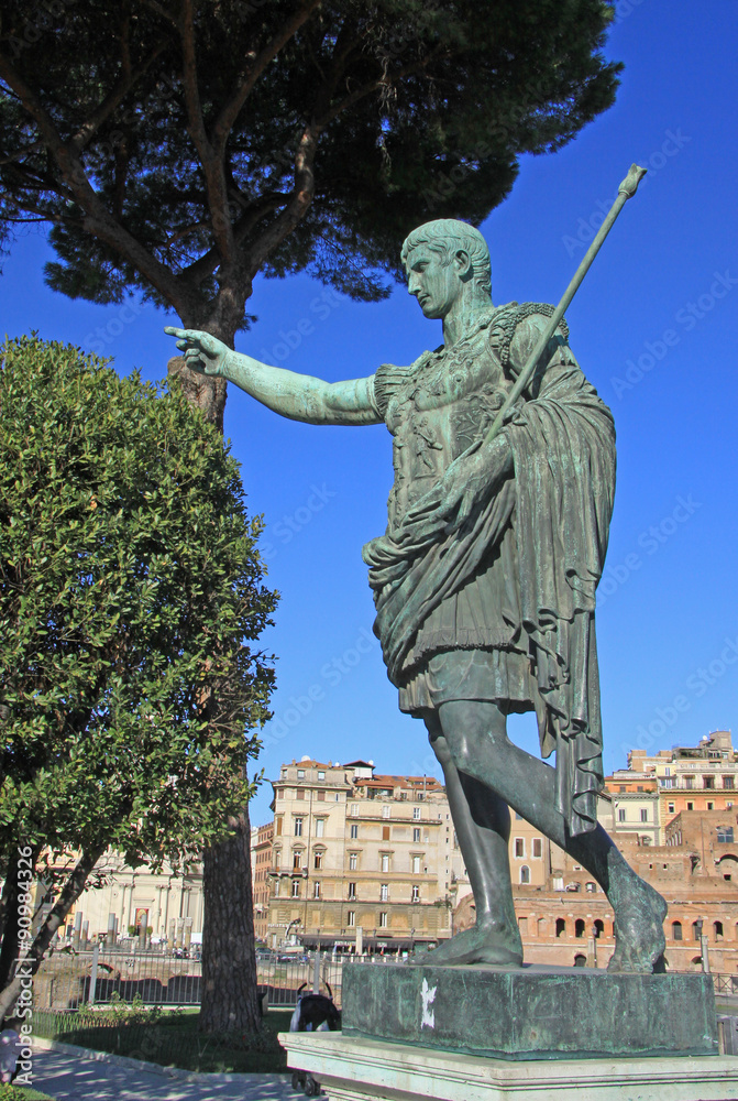 Bronze statue of emperor Caesar Augustus on Via dei Fori Imperiali, Rome, Italy