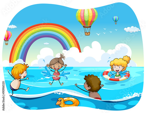 Children swimming in the ocean © GraphicsRF