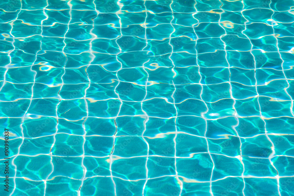 blue swimming pool with sunny reflections