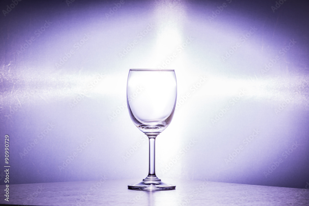 Wine glass placed on white background.