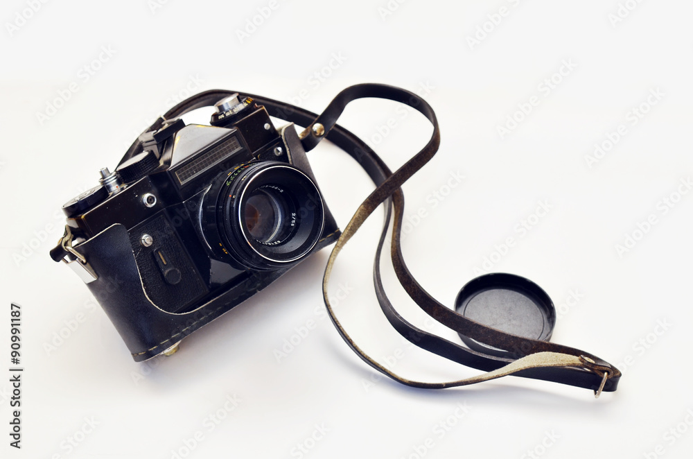 Old photo camera.
Old photo camera on a white background. Camera in leather carrying case with strap, lens. Zenit. Old photo camera.
Old photo camera on a white background. Camera in leather carrying case with strap, lens. Zenit.