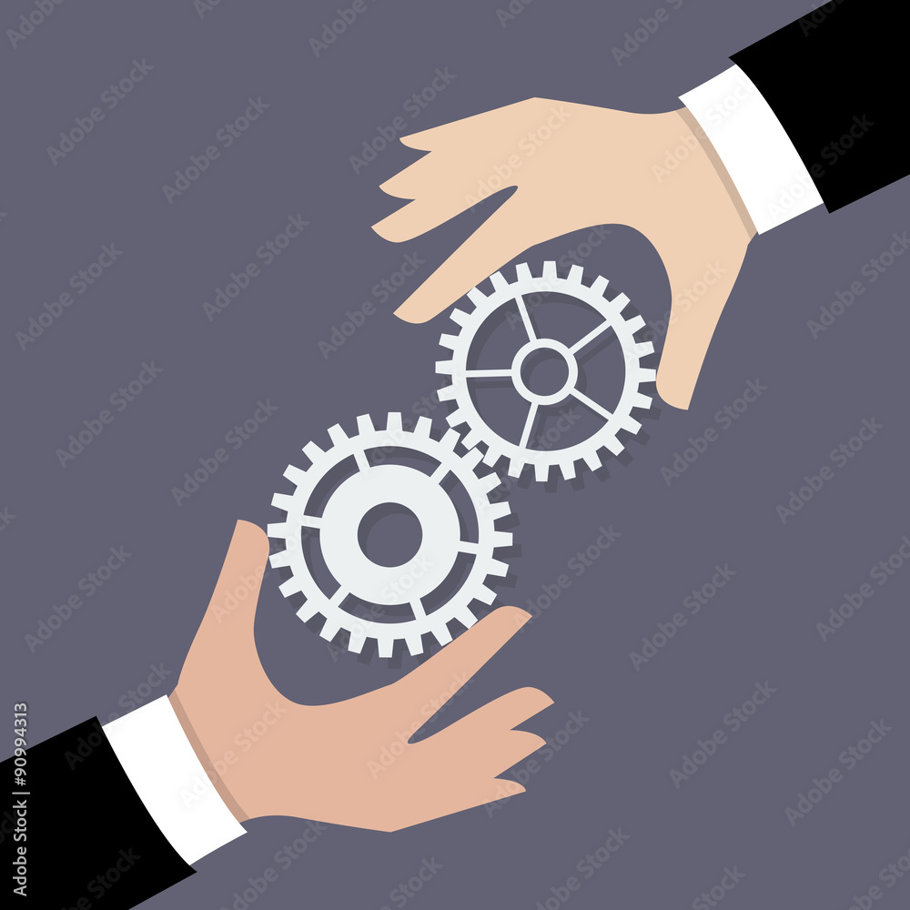 Two businessman hands with gears Two businessman hands with gears