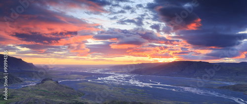 Tranquil and cloudy sunrise on mountaintop Valahnùkur in Pórsmörk, Iceland.