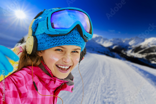 Skiing, skier - winter season in Swiss Alps