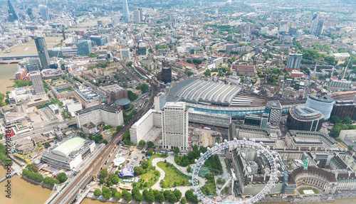 Helicopter view of London with buildings and river Thames