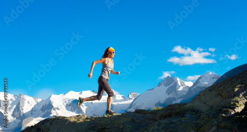 Girl runs in the high mountains