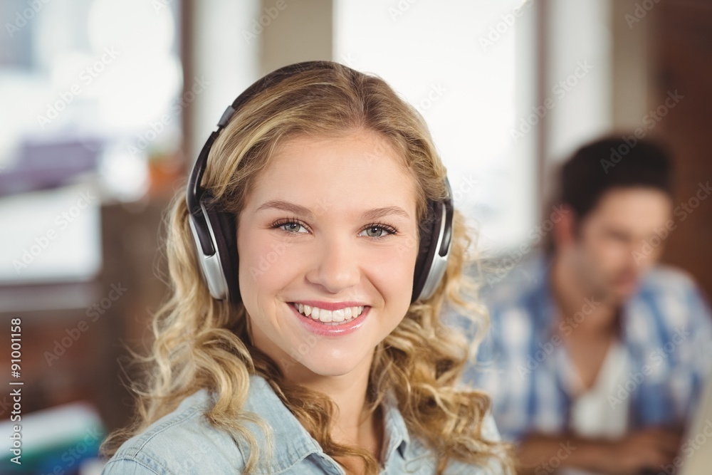 Confident smiling businesswoman in office Confident smiling businesswoman in office