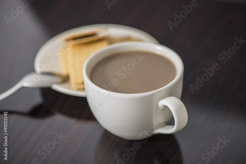 Soft focus Cup of coffee on table
