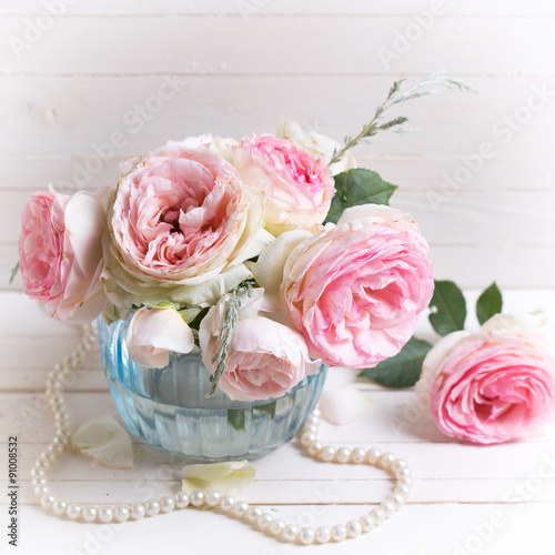 Pink roses in vase © daffodilred