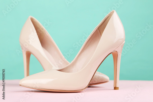 Pair of beige women's high-heeled shoes
