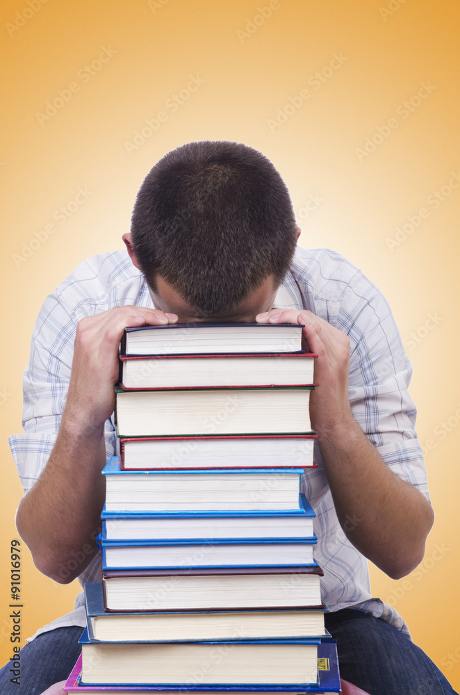 Student with lots of books on white Student with lots of books on white