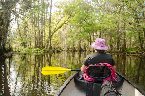 Woman in Canoe on Hillsborough River, Florida © domromer