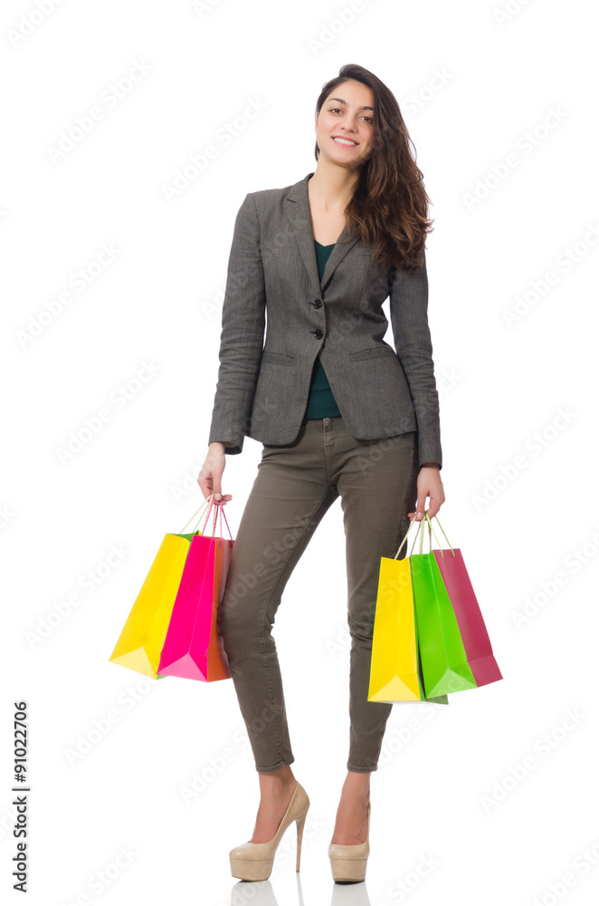 Attractive woman with shopping bags isolated on white Attractive woman with shopping bags isolated on white