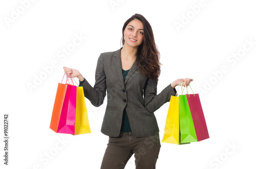 Attractive woman with shopping bags isolated on white © Elnur